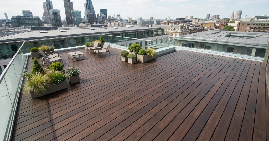 Ultimate FBR modified hardwood decking on a commercial rooftop terrace showing fire performance B-s2-d0 compliant exterior deck specification